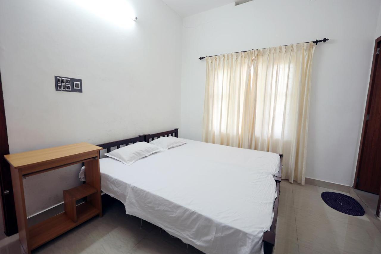 Daffodil Rooms - Non Ac Tellicherry ภายนอก รูปภาพ