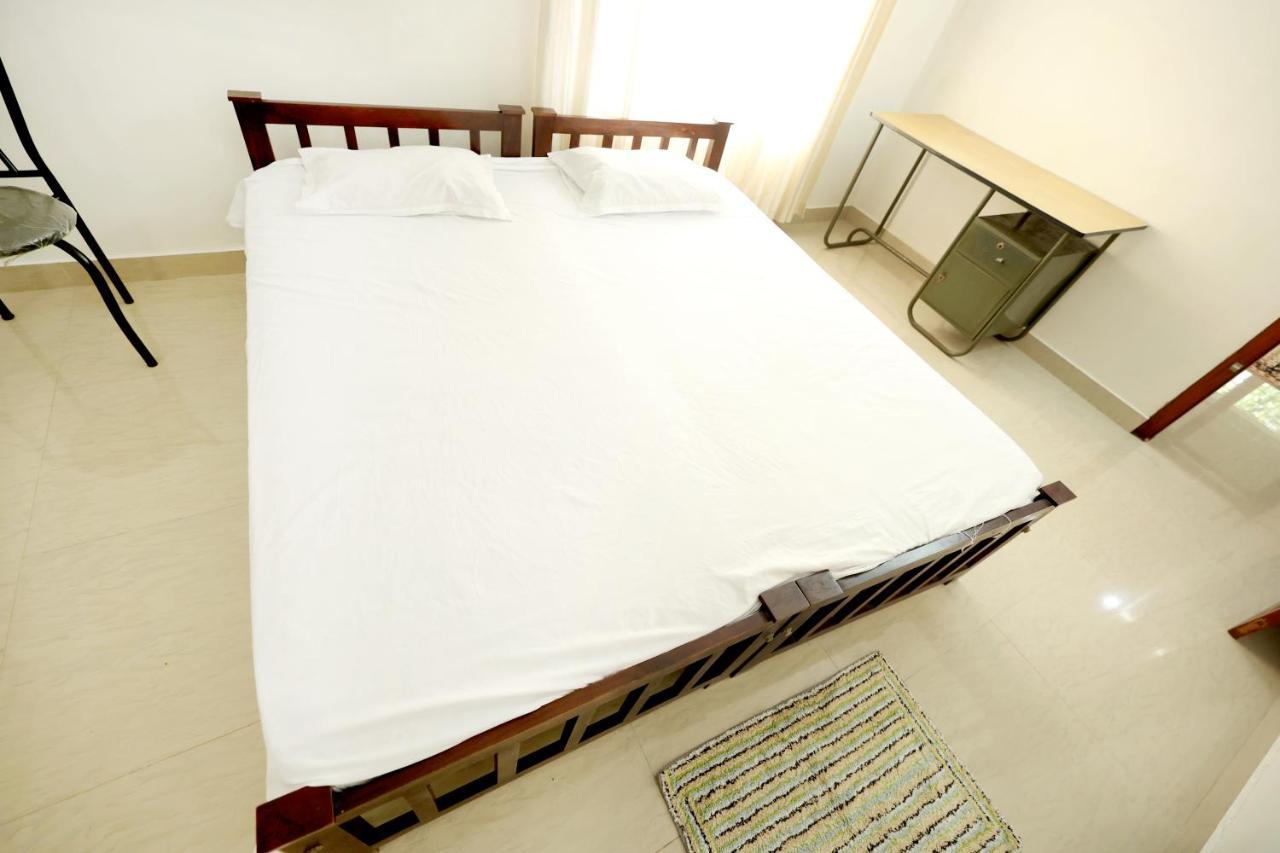 Daffodil Rooms - Non Ac Tellicherry ภายนอก รูปภาพ